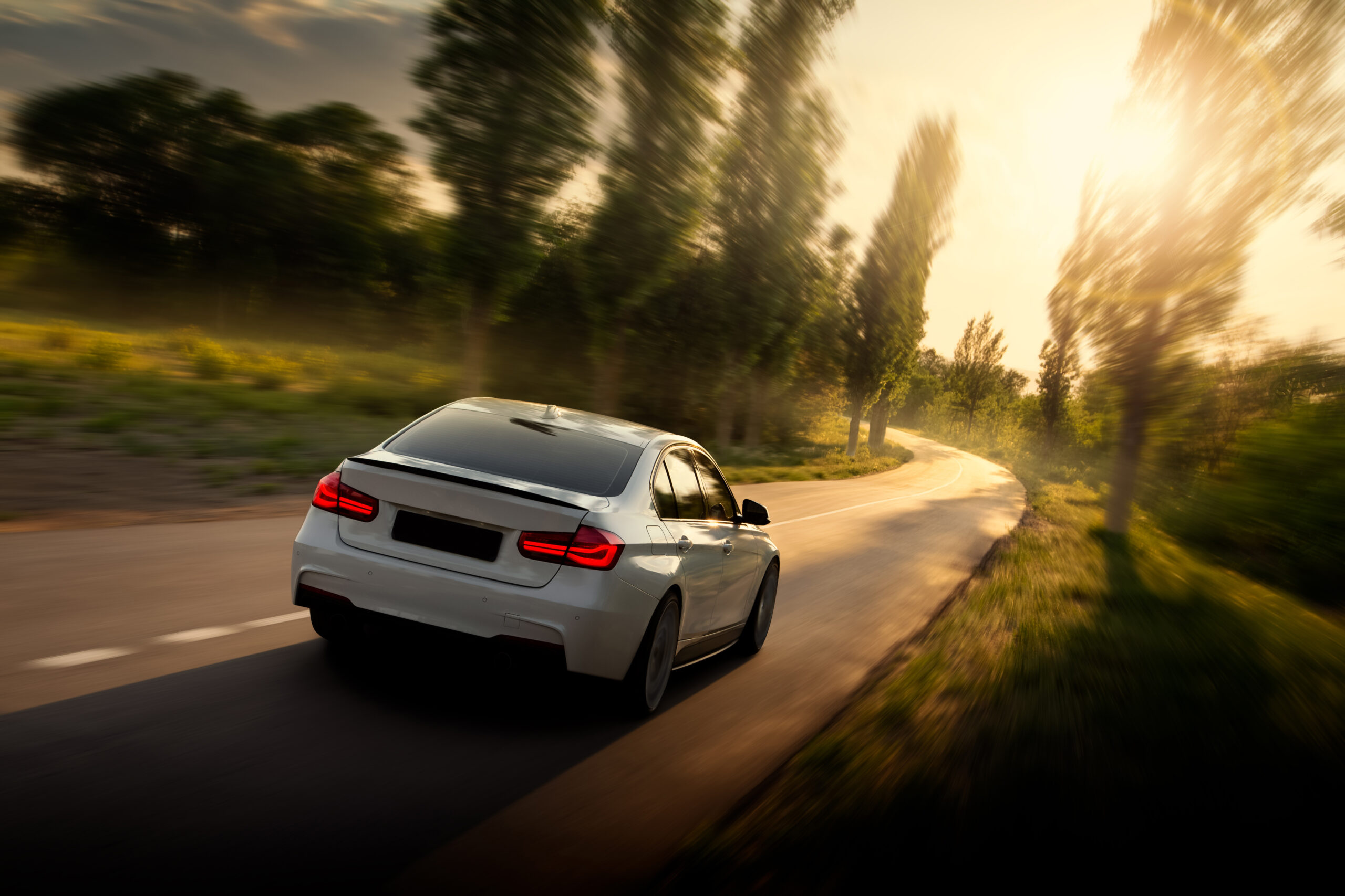 vehicle driving on the road, representing car insurance protection.