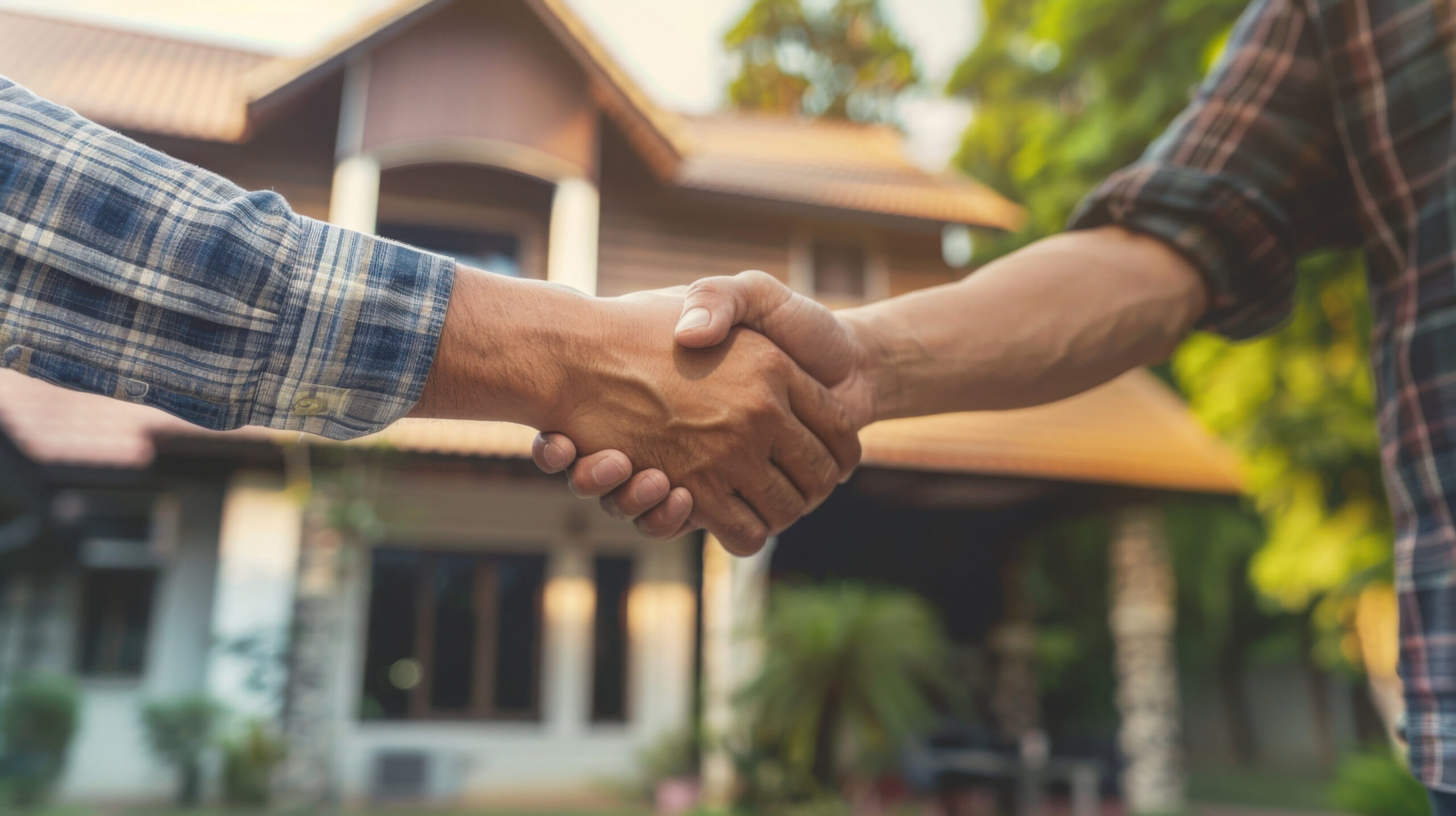 handshake in front of house, landlord investment protection